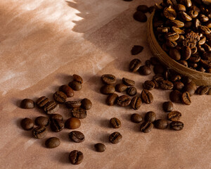 Coffee beans on a brown background
