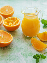 Glass jug of fresh orange juice
