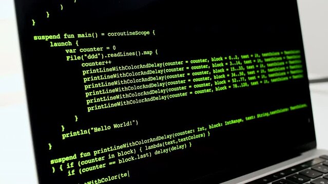 Developer is browsing html code on the computer screen. Scroll of HTML Web Page Code. Programming code abstract technology background. Computer script concept. High quality 4k footage