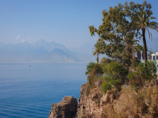 Fototapeta na wymiar picturesque Mediterranean coast off Antalya. travel to turkey, old town Kaleci. discover interesting places and popular attractions and walks.