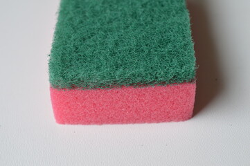 Abrasive kitchen sponges for removing grease and dirt on a white background