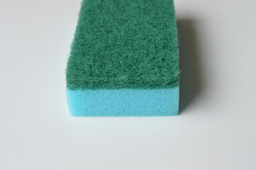 Abrasive kitchen sponges for removing grease and dirt on a white background