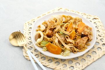 Kwetiaw or Kwetiau is Chinese food which is popular in Indonesia, cooked by frying added with chicken, seafood and complementary vegetables. 