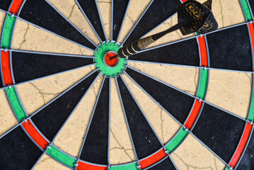 Den Helder, Netherlands. August 2022. Dart in the bullseye of the dartboard.