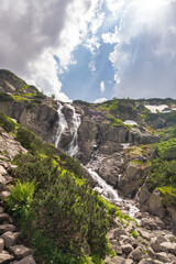 Fototapeta na wymiar waterfall in the mountains. Siklawa - Tatra mountains Poland.