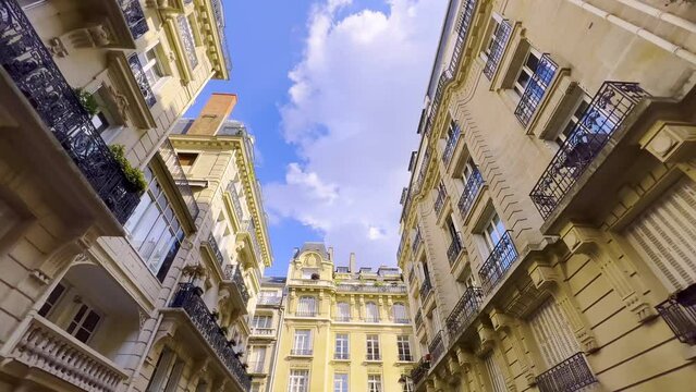 Camera movement along Parisian French streets with old houses. Low Angle Shooting