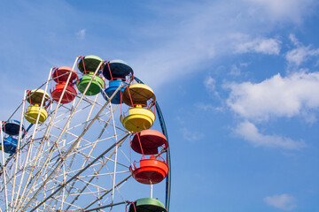 Multicolored Ferris wheel in Izmailovsky Park , Moscow, Russia