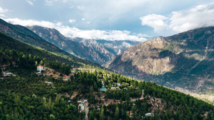 Fototapeta na wymiar golden hour aerial landscape of natural Himalayan mountain range in Himachal Pradesh India