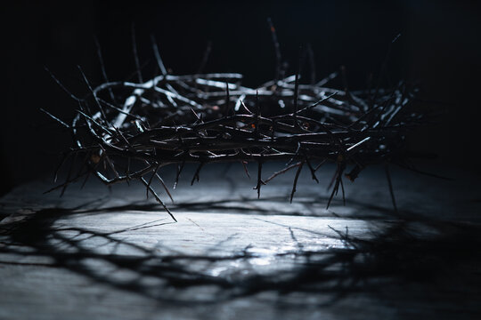 Crown of thorns as a symbol of death and resurrection of Jesus Christ for our sins. Horizontal image.