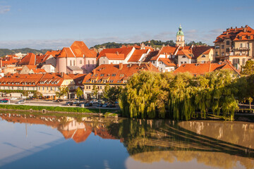 Lent district in Maribor, Slovenia. Popular waterfront promenade with historical buildings and the oldest grape vine in Europe.