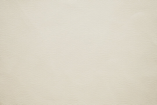 Cream color background from leather sheet texture 