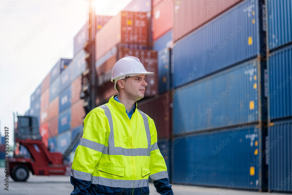 Poster container yard worker checking container at container yard warehouse,logistics transportation and sh