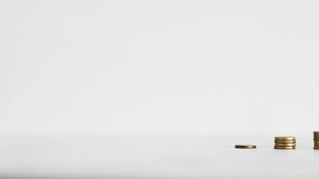 growing stacks of coins representing increasingly expensive prices or savings and compound interests increasing, finance and money concept