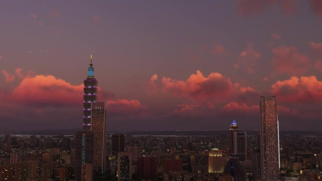 Aerial sunset side view of Taipei City buildings, Taiwan