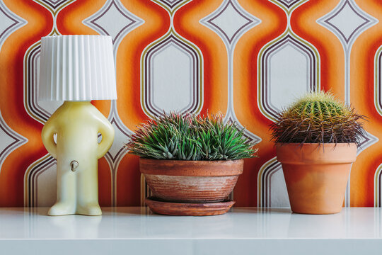 Lamp ball with number and plant on table