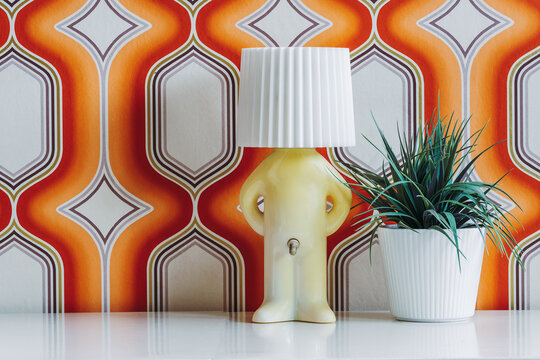 Lamp ball with number and plant on table