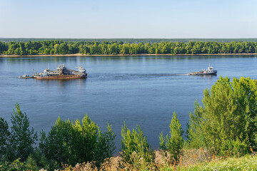 Dredger towing on the river