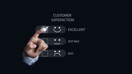 Customer service and Satisfaction, Businessman Hand choosing screen on happy Smiley face icon to give satisfaction in service.