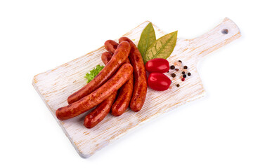 Roasted sausages, barbecued sausages, isolated on white background.