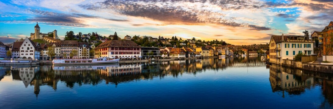 Historical medieval towns of Switzerland.  Scenic Schaffhausen  and view of Munot castle over susnet, Rhein river