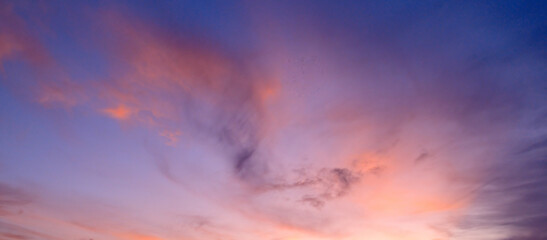 Fototapeta na wymiar Bright sunset (sunrise) and light clouds.