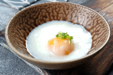 Japanese onsen egg or Soft boiled egg on the table 