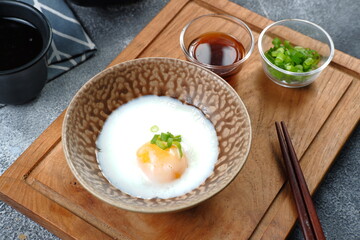 Japanese onsen egg or Soft boiled egg on the table 