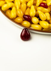 Yellow and red Cornelian cherry dogwood or cornus mas beries. Healthy low carb berry. Pulpy, sweet and sour fruit.