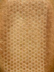 The bottom of a baked crispy roll