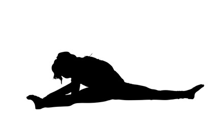 Silhouette of woman practicing yoga 