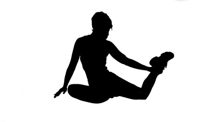 Silhouette of young sporty attractive woman working out 