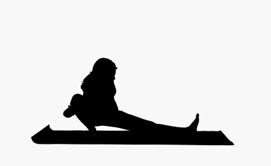 Silhouette of young sporty attractive woman wearing sportswear warming up on a mat at gym 