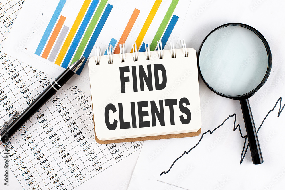 Poster find clients text on notebook on the graph background with pen and magnifier