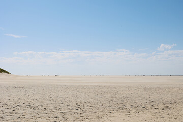 Wide beaches and sand dunes on the Dutch island of Texel on a sunny day, The Netherlands.
