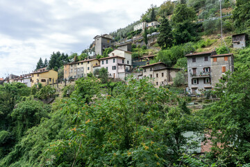 Fototapeta na wymiar Little village in Tuscany, Italy called Metato in the mountains with green forrest