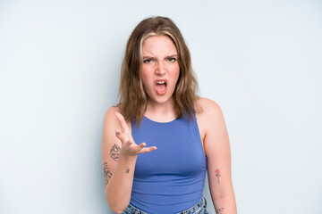caucasian pretty woman looking angry, annoyed and frustrated screaming wtf or what’s wrong with...