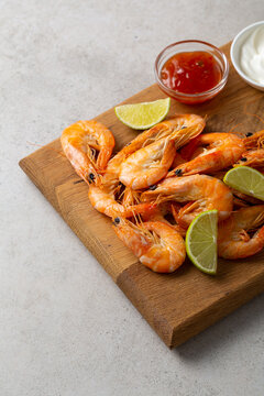 Seafood shrimps on wooden boards lime sauces dip snack food