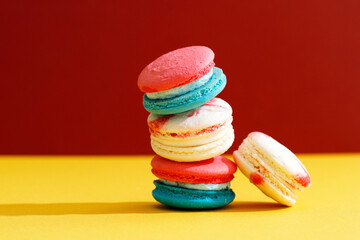 Stacked Macaroon on Red Background, Copy Space