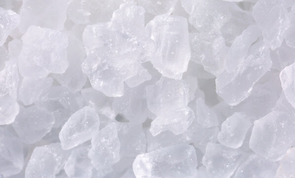 Salt crystals, sea salt as background and texture. Ice crystals
