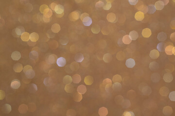 Gold bokeh background. Bright colorful abstract background. 