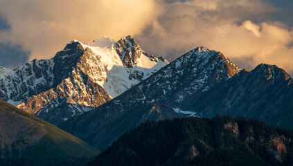 Fototapeta na wymiar sunset over the snow mountains