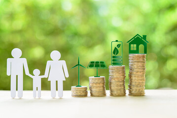 Eco-friendly and sustainable living, environmental concept : Family with one children, coin stacks...