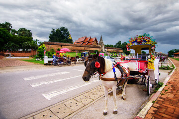 The horse carriage in Lampang at Wat Phra That Lampang Luang , Lampang province in LAMPANG THAILAND