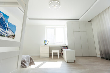 Workspace with desk and chair in modern room for children. Working table in kid's room.