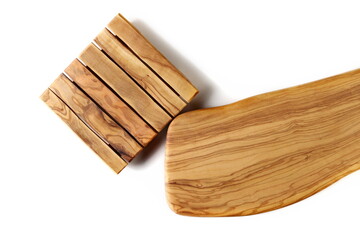 Wooden chopping board from olive wood isolated on white, top  view  