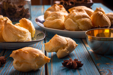 Profiteroles stuffed with cream, homemade bakery. close up