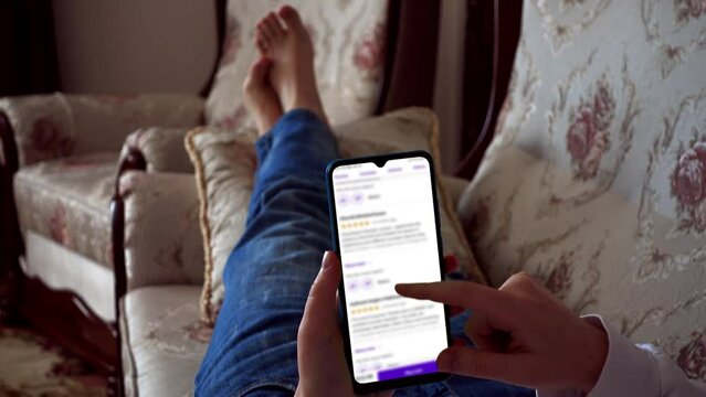 A teenager looks online training, courses and ratings