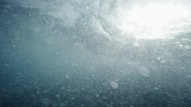 Rough sea waves seen from underwater in winter