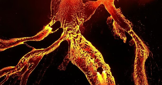  Shot by drone tracking thick flows of slow moving lava.