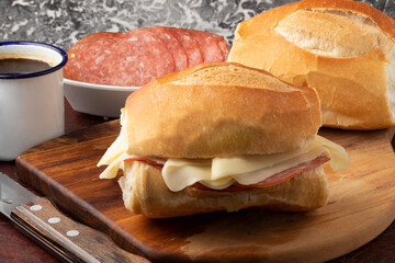 Traditional Brazilian snack French bread stuffed with salami and cheese.